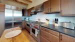 Fully stocked kitchen with stainless steel appliances